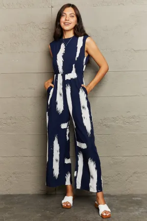 Perfee Printed Round Neck Cutout Jumpsuit With Pockets Mega Sale Now